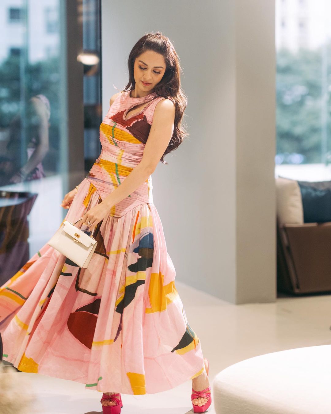 Marian Rivera wearing pink Aje dress adorned with different geometric figures